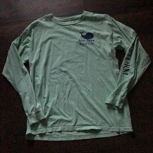 Teal long sleeve shirt with design on the back